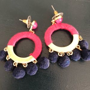 Pink drop earrings with navy Pom Poms
